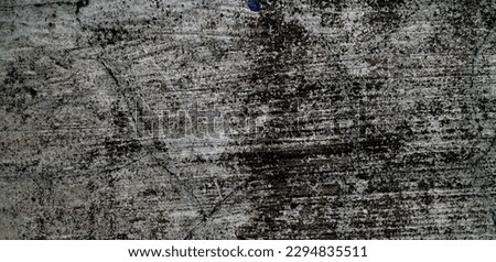 Charming abstract textures and structures. Attractive raw and uneven concrete wall surface looks natural gray texture.
