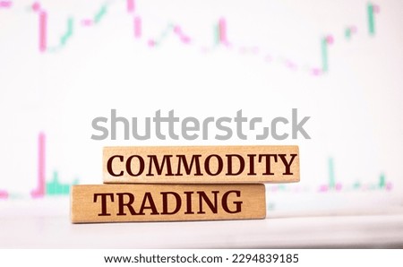 Wooden blocks with words 'commodity trading'. Business concept
