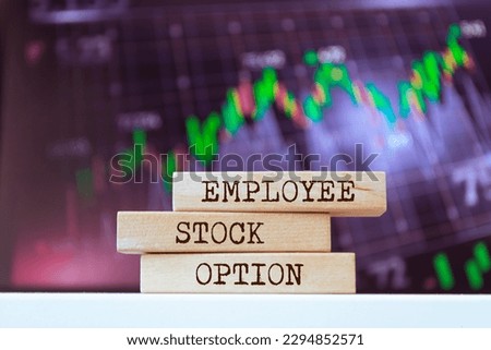 Wooden blocks with words 'Employee Stock Option'. Business concept
