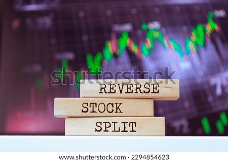 Wooden blocks with words 'Reverse Stock Split'. Business concept