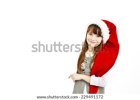 Little christmas girl presenting. Isolated on white background 