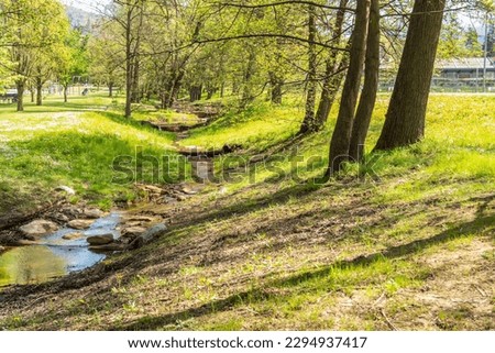 View of the Levico lake park. Trentino Alto Adige, Italy Royalty-Free Stock Photo #2294937417