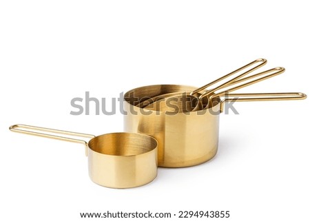 Metal measuring cups on white background Royalty-Free Stock Photo #2294943855