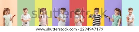 Collage of different children with flashlights on color background