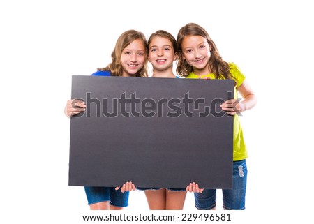 happy kid girls holding black board copyspace on white background