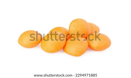 Tasty orange chewing gums isolated on white