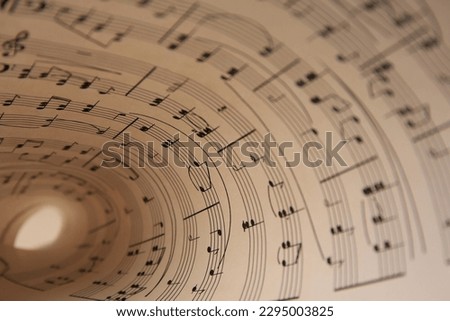 Closeup view of sheet with music notes Royalty-Free Stock Photo #2295003825