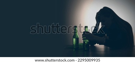 Suffering from hangover. Woman with alcoholic drink at table against black background, space for text. Banner design