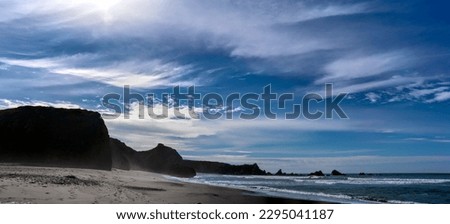 Deep blue skies over a beach at Big Sur California's southern tip