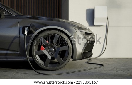 Close up of modern generic electric vehicle EV hybrid car is being charged from a wallbox near a contemporary modern residential building house Royalty-Free Stock Photo #2295093167