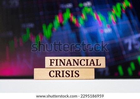 Wooden blocks with words 'Financial crisis'. Business concept