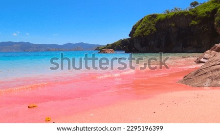 Pink beach Labuan Bajo Indonesia blue ocean and blue sky