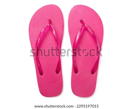 Bright flip flops isolated on white, top view Royalty-Free Stock Photo #2295197015