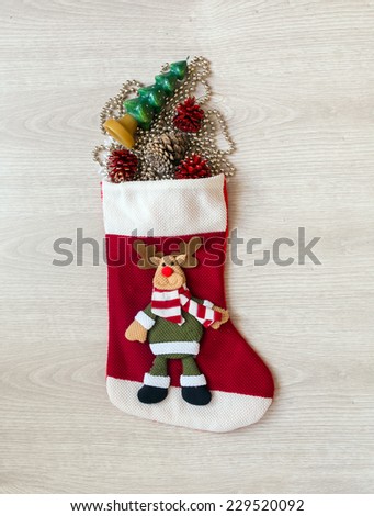 Christmas sock with alot of presents.