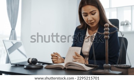 Portrait of female asian lawyer manager in formal suit working with signed insurance contract law, legal, legislation, online consulting real estate clients close deal in realtor office.
