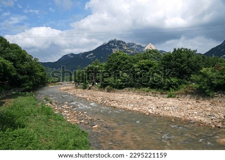 Changneungcheon Stream in Bukhansan Mountain with clear water Royalty-Free Stock Photo #2295221159