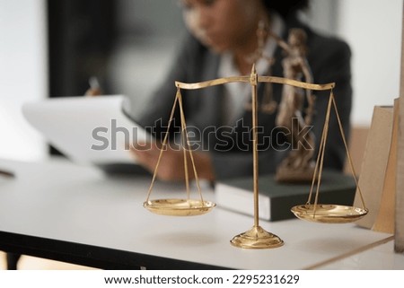 Lawyers Asiawoman   having through online Concepts  of Legal services at the law office.