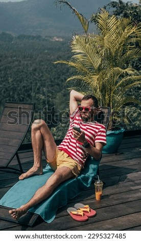 fashion beard man portrait, tattoo hand, Handsome man beard using smartphone in hand, happy face, street photo, hipster style portrait, isolated, make video, instagram. facebook, villa, subbed,juice