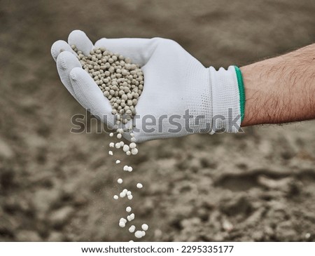 Granulated mineral fertilizer used in agriculture Royalty-Free Stock Photo #2295335177