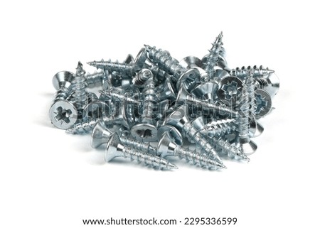 Tapping screws made of steel, metal screw, iron screw, chrome screw. Isolated on white background. Side view. High resolution photo. Full depth of field. Royalty-Free Stock Photo #2295336599