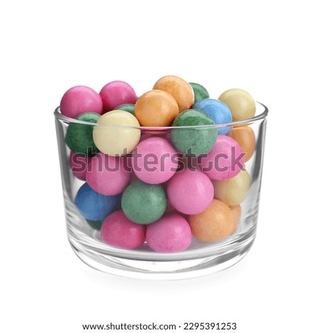 Bowl with many bright gumballs isolated on white
