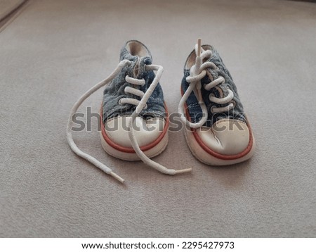 Blue white little baby shoes 