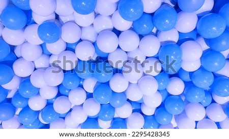 White and Blue Ball Composition