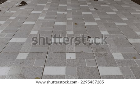 Tiled floor with checkered motif