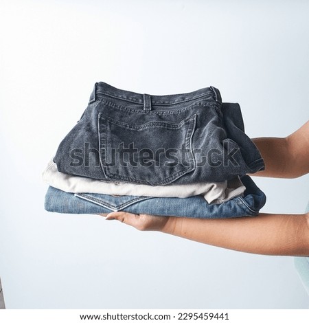 group photoshoot of a variety jeans color in a white isolated background.