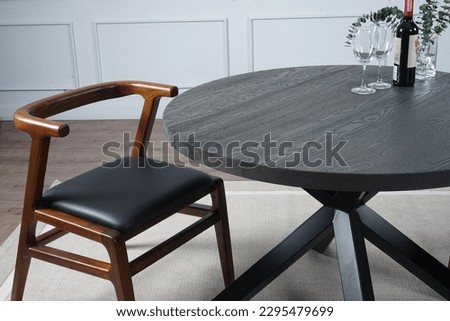 Black wooden table on carpet in white room ,mock up for interior Royalty-Free Stock Photo #2295479699