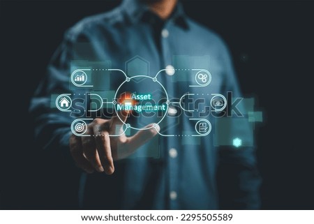 Concept of asset management in business technology and the internet. This involves the tracking, maintenance, and optimization of various types of assets, including physical and digital resources. Royalty-Free Stock Photo #2295505589