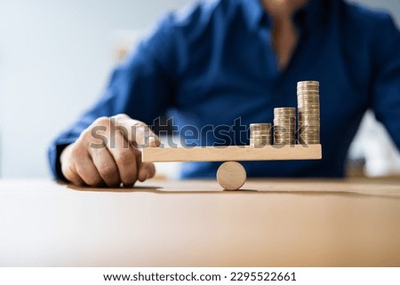 Money Leverage And Inflation Balance. Financial Concept Royalty-Free Stock Photo #2295522661
