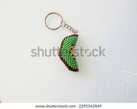 Colorful key chain on a white. Bright key chain on a white