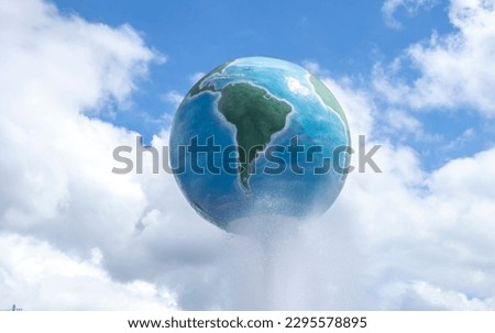 Structure of planet earth with blue sky and clouds in the background.
