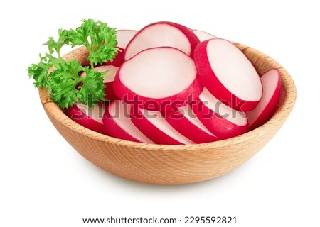 Radish slices in wooden bowl isolated on white background with full depth of field Royalty-Free Stock Photo #2295592821