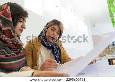 Young Middle Eastern two businesswoman in business meeting