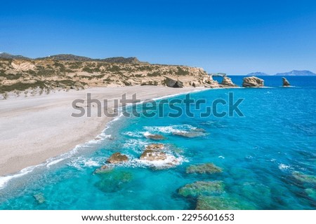 The beach of Triopetra with turquoise sea in Southern Crete, Greece Royalty-Free Stock Photo #2295601653