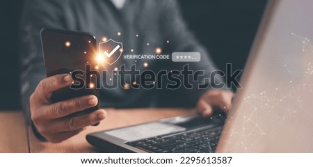 Two factor authentication or 2FA concept, Man using laptop computer for login protection and validate password with smartphone, Secure notice login verification or SMS secure verification method. Royalty-Free Stock Photo #2295613587