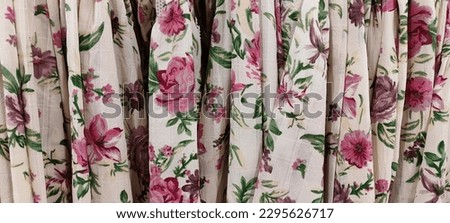 white shirt with a picture of flowers with a cloth texture 