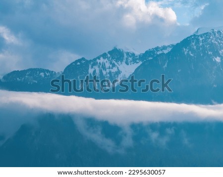 Low clouds in the Swiss Mountains - travel photography