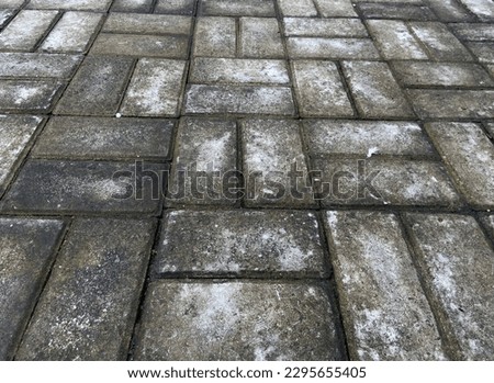 Pavement of granite in the town street - stock photo
