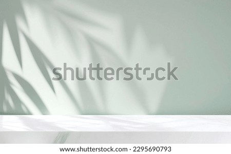 Minimalistic light background with blurred foliage shadow on a light wall. Beautiful background for presentation with with marble floor. Royalty-Free Stock Photo #2295690793