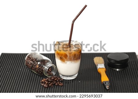 Latte ice coffee special menu, put on the bar mat, coffee beans and milk and espresso coffee on the top,picture concept isolate object.