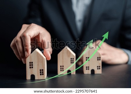 Increased value of real estate or property house. Businessman owner home investment planning real estate business, Percentage rental income earning profit Investor thinking strategy.