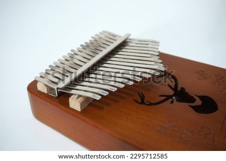 Kalimba musical instrument originating from Africa isolated on white background