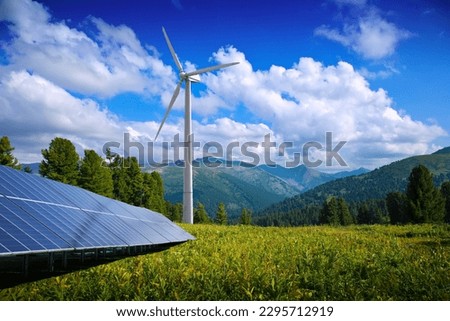 solar panels and wind turbine-green planet-renewable energy Royalty-Free Stock Photo #2295712919