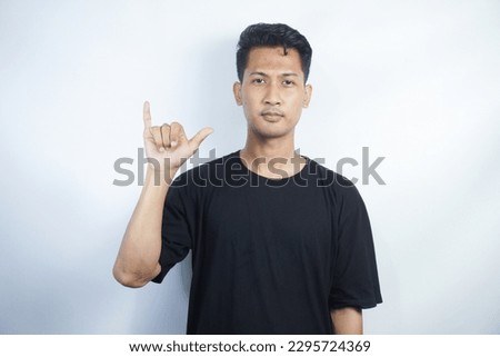 Man showing letter Y isolated on white background, closeup. Finger spelling alphabet in American Sign Language. ASL concept