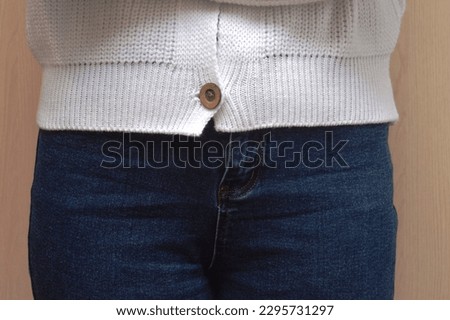 Stylish fashionable women's blue jeans worn by a girl