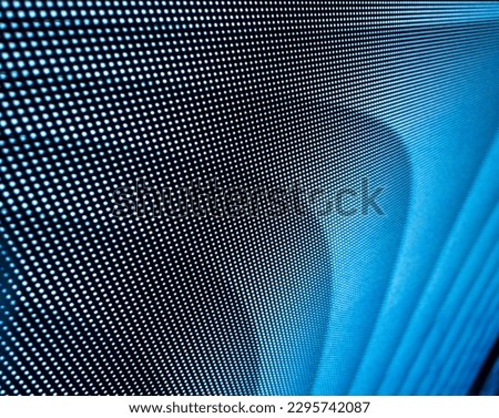 Detail of ultra high definition led or lcd screen pixels as a digital mesh forming a geometric color gradient.