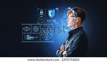 Pensive businessman with arms crossed, digital biometric scanning with data analysis. Face detection and personal information hologram. Concept of face id and artificial intelligence Royalty-Free Stock Photo #2295754823
